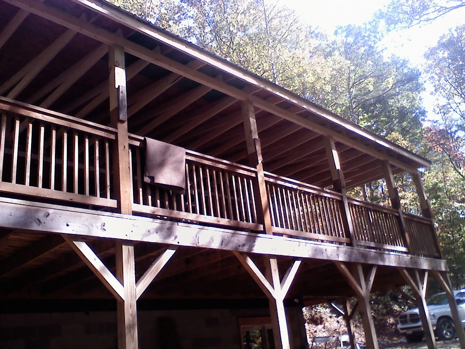 Timber framing under a new elevated porch and deck — Roof Leak Repair in Churubusco by Roofing Brothers